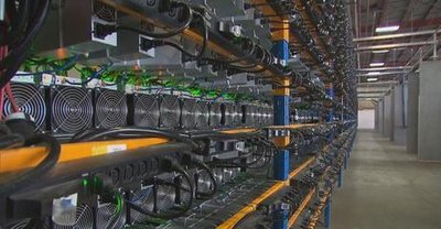 A modern mining farm with numerous rigs