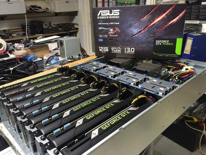 Close-up of the components of a mining rig, highlighting the motherboard, power supply, and cooling fans.